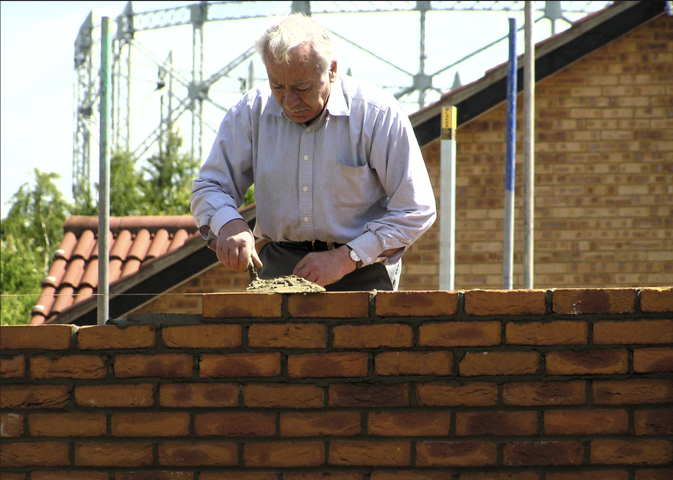 A man laying brick.