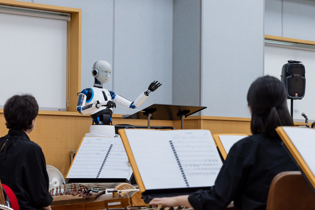 A robot conducting an orchestra.